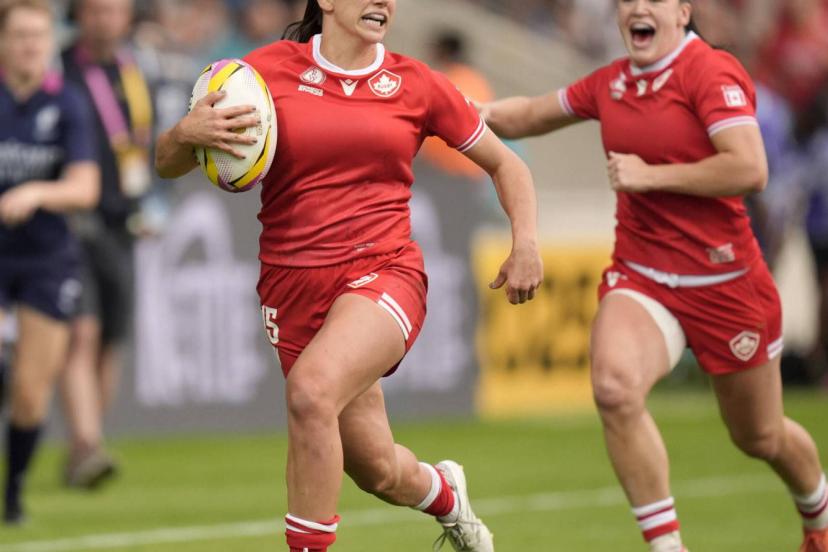 La Canadienne Julia Schell a inscrit six essais ce samedi. (D. Lawson/PA via AP)